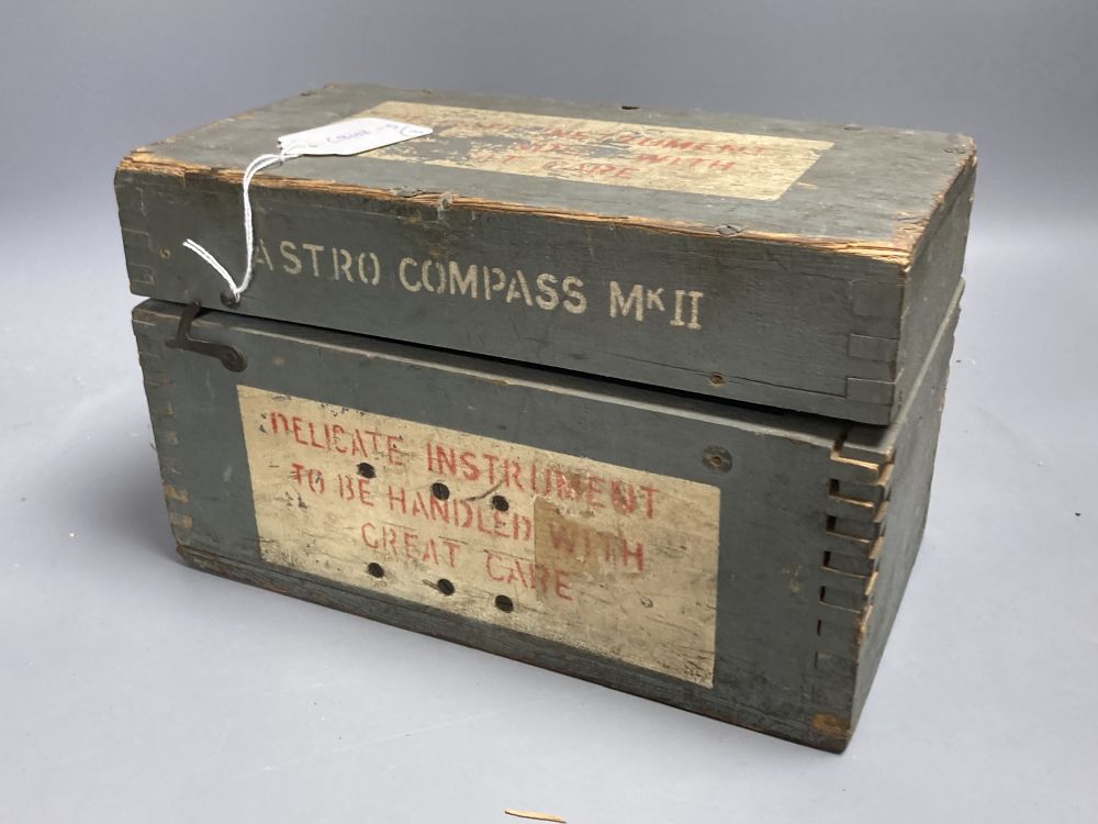 An Air Ministry Astro compass MkII, a similar compass, both cased, a Hydrographic Office Star Identifier and spare Azimuth circle compa